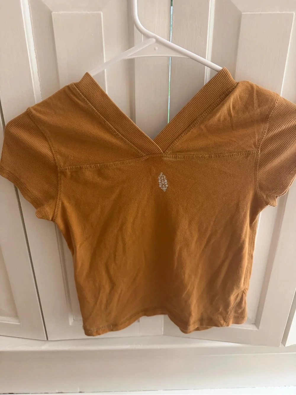 Free People Short Sleeve V-Neck Tee in Rusty Mustard